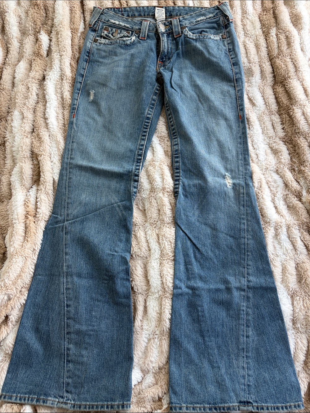 True Religion Light Blue Flare Jeans with Subtle Distress